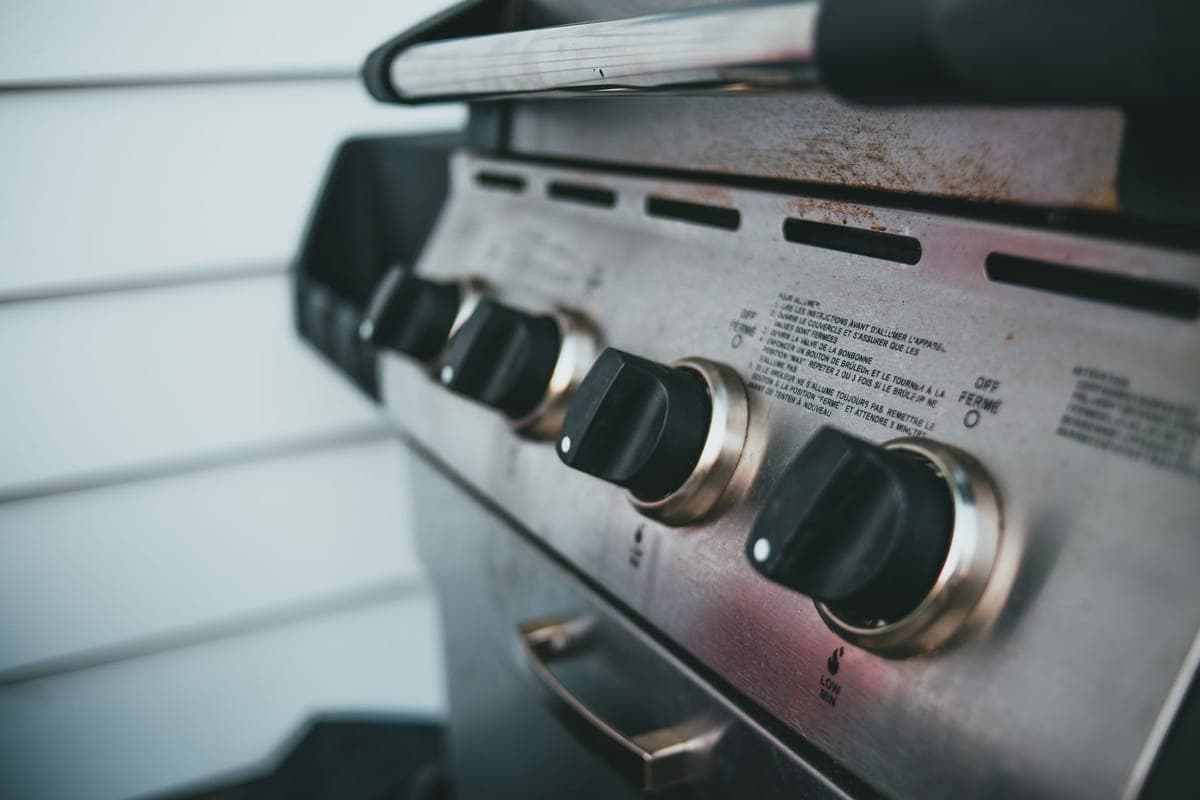 Control knobs on a stainless steel gas grill