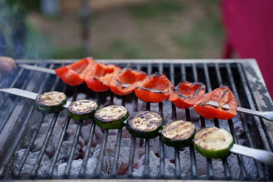 Grilled peppers and courgette on a barbecue